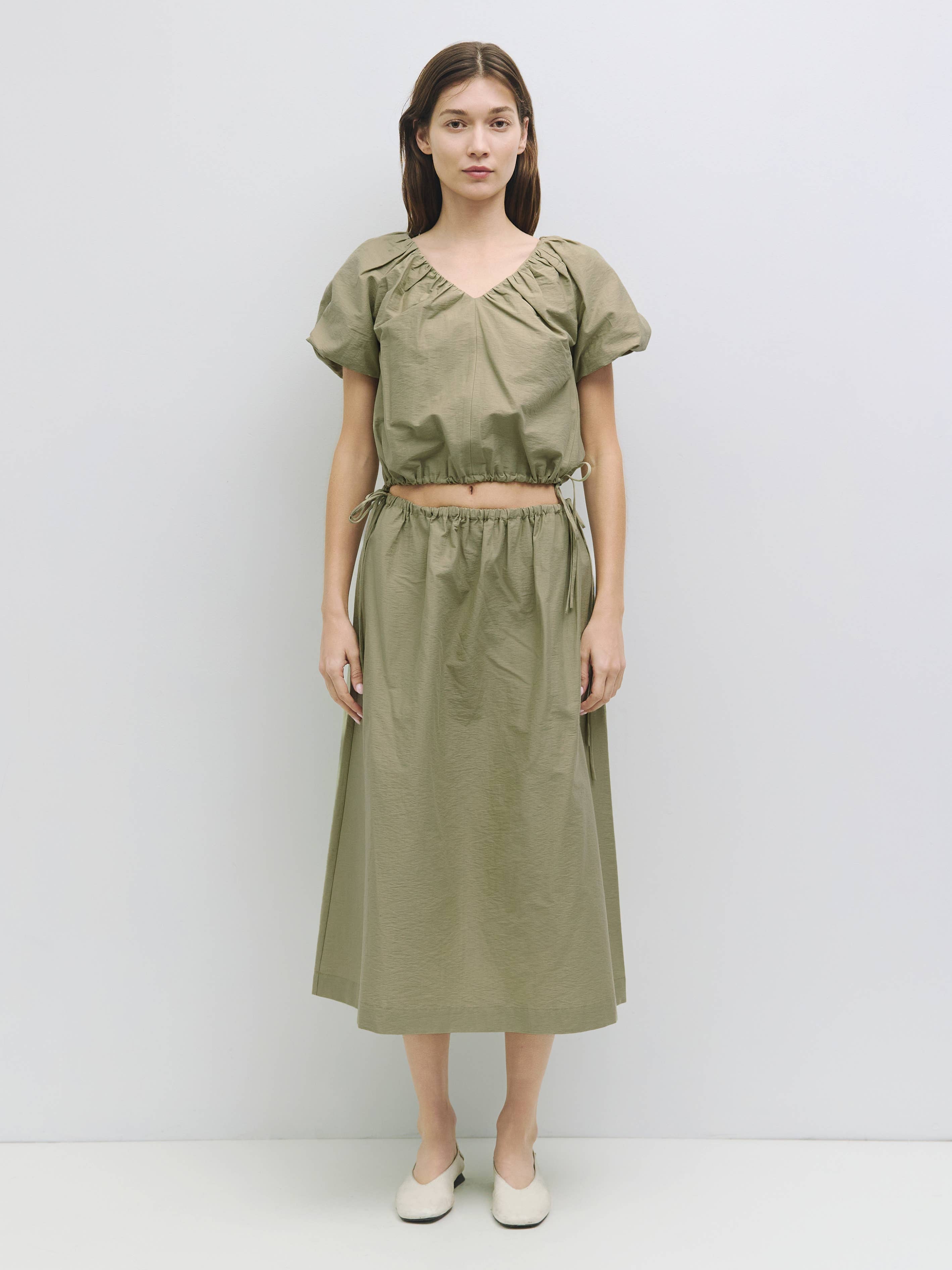 The Ina Bubble Hem Top with Side Ties in Olive or White