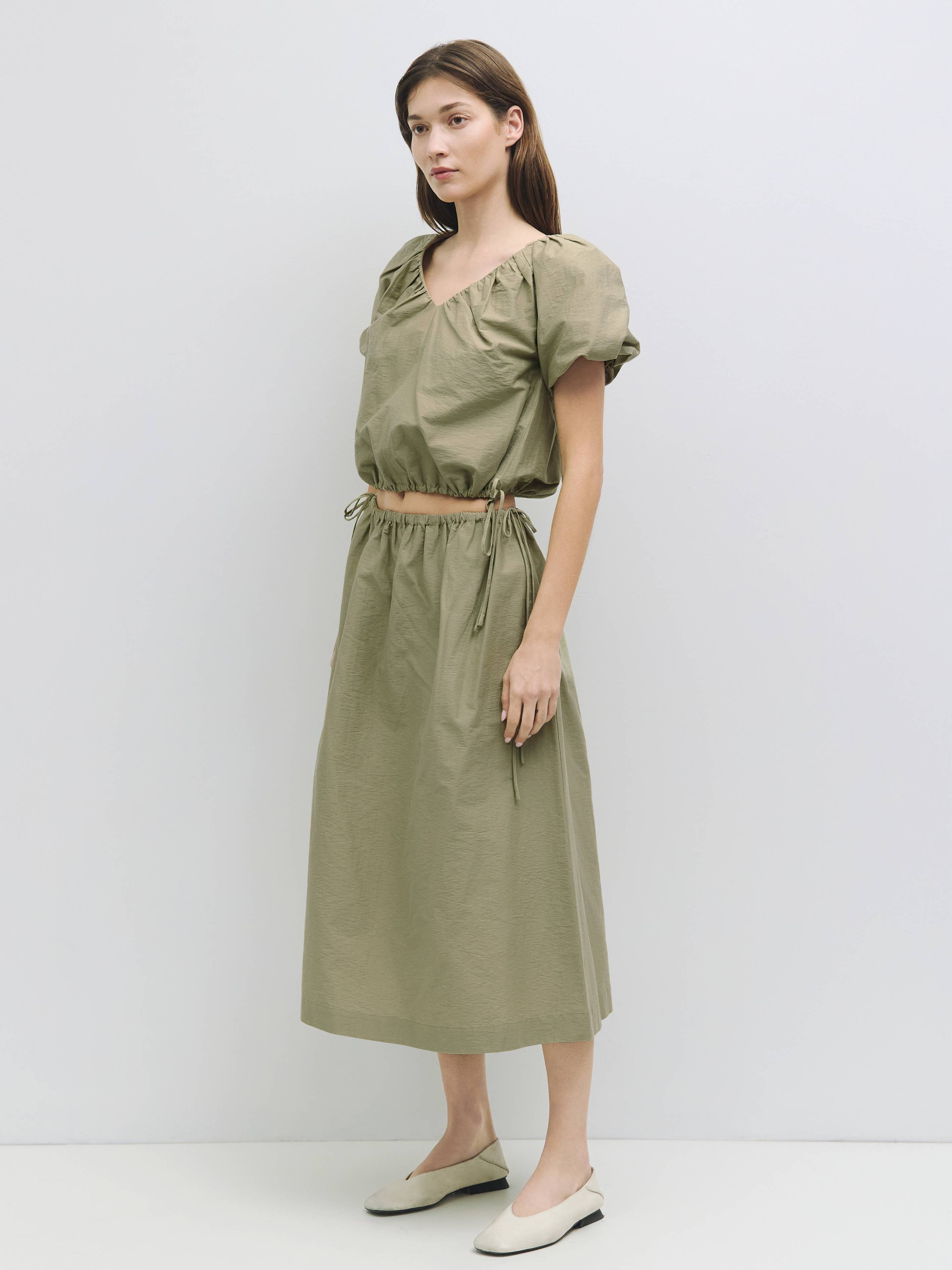 The Ina Bubble Hem Top with Side Ties in Olive or White