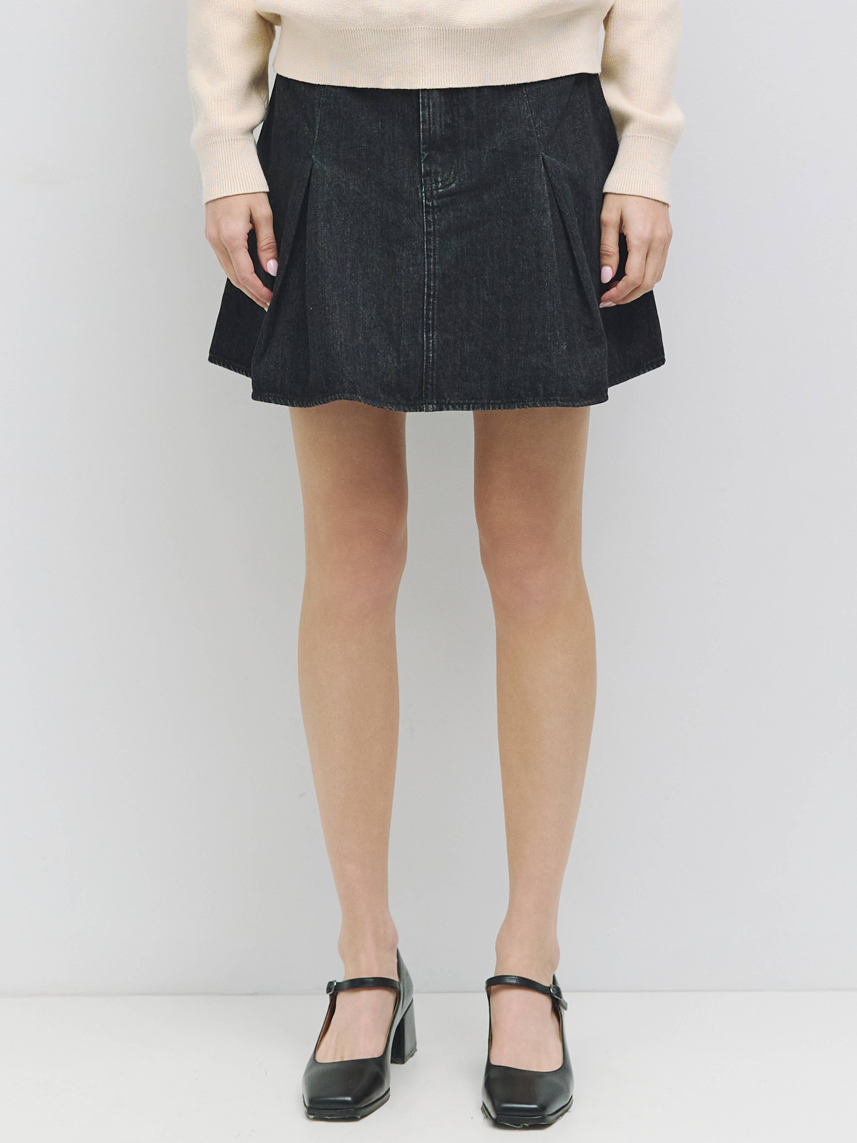 The Carmel Pleated Mini Denim Skirt in Black