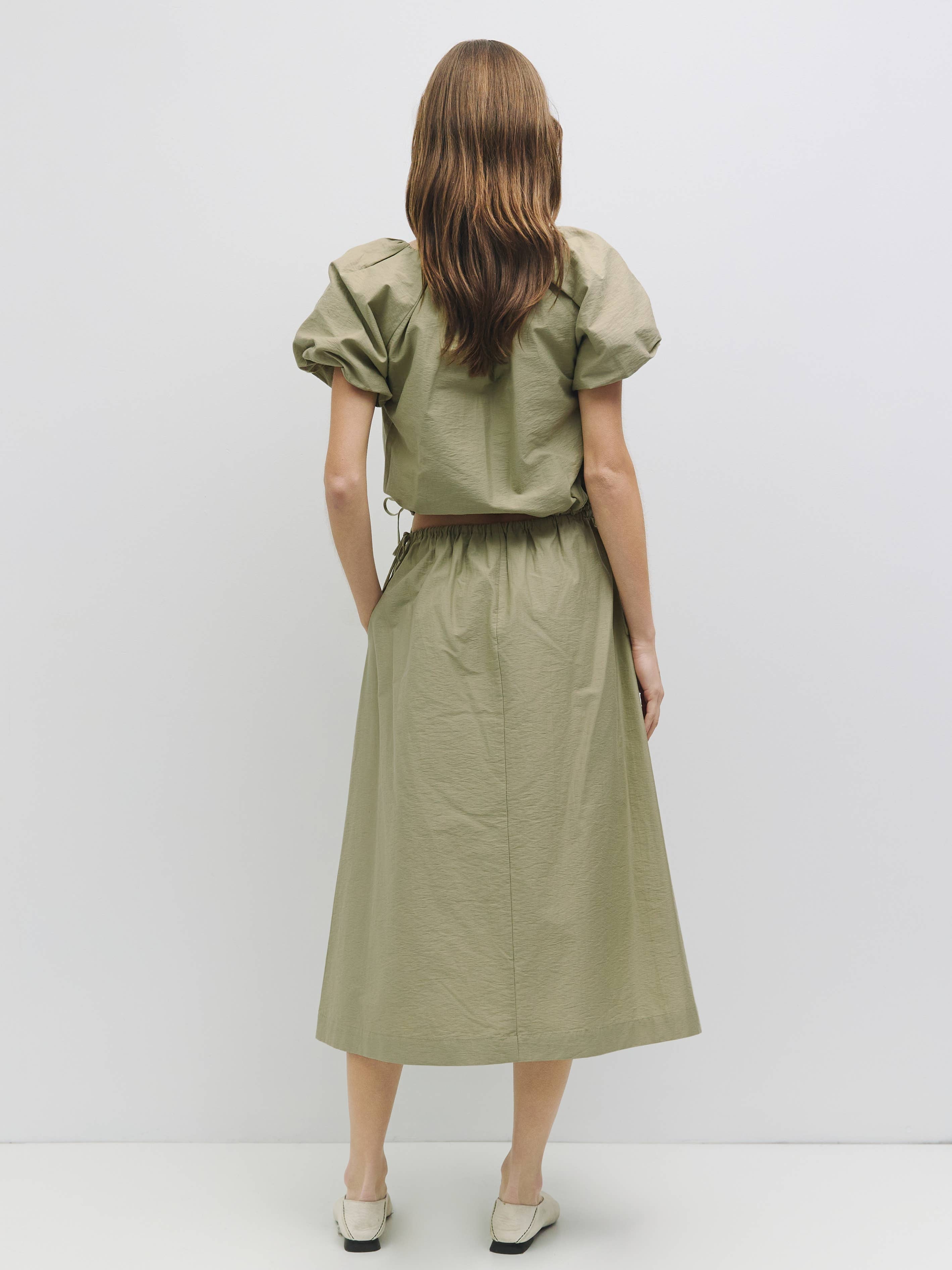 The Ina Bubble Hem Top with Side Ties in Olive or White